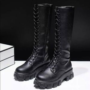 Calf-high platform combat boots